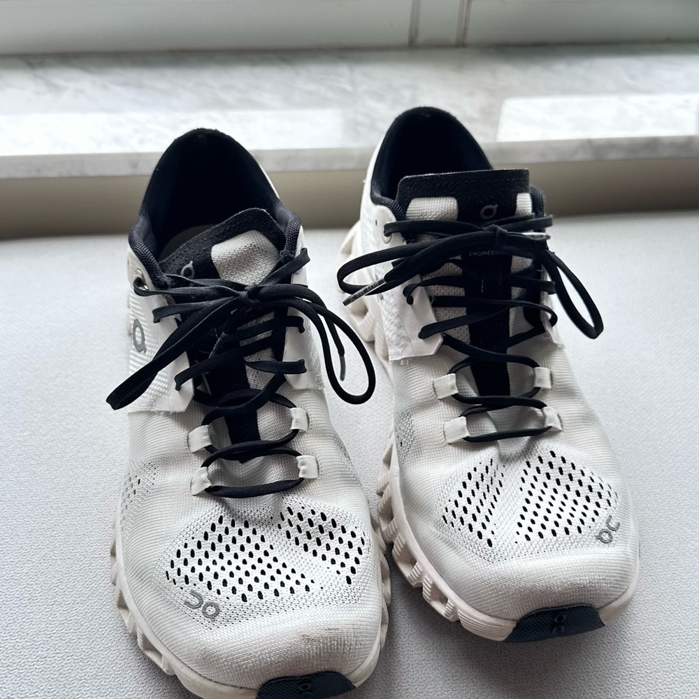 On Running White and Black Athletic Sneakers